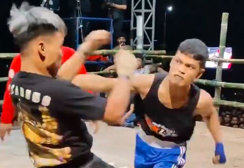 Boxer Brutally Knocks Out Muay Thai Boxer
