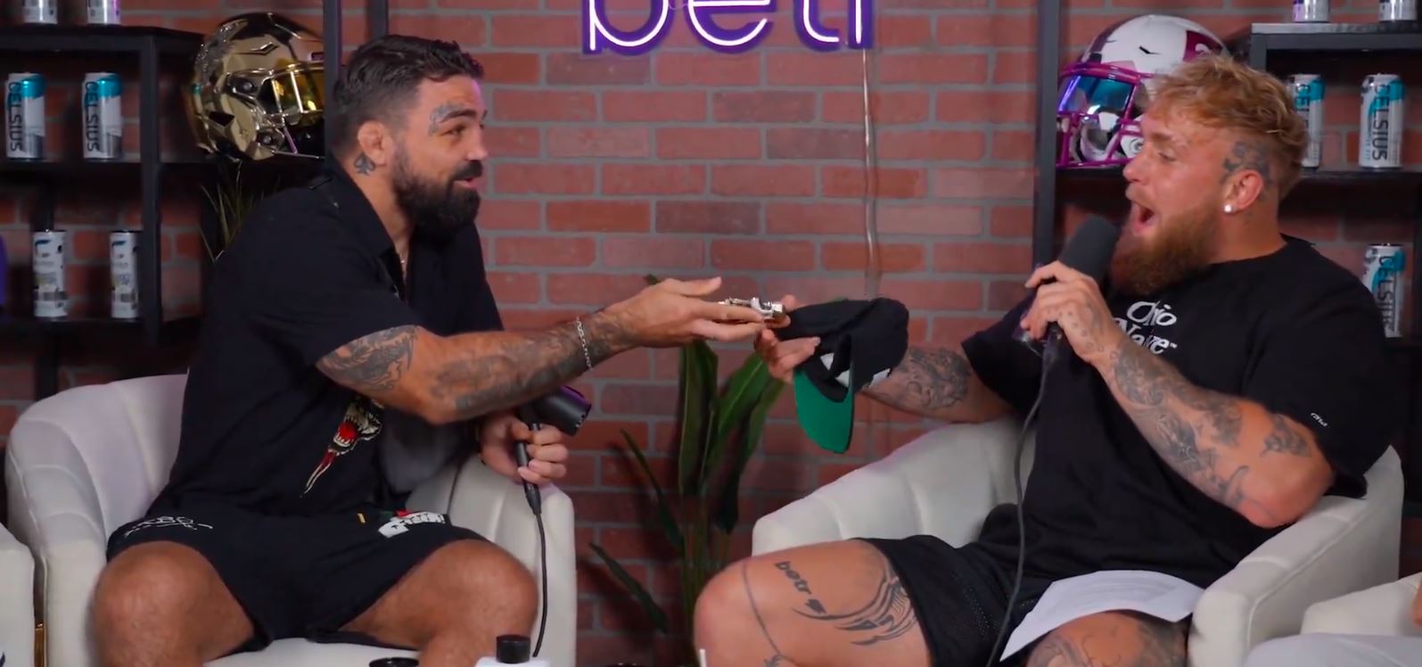 Mike Perry Gives Jake Paul Chain Of His Beaten Up Face