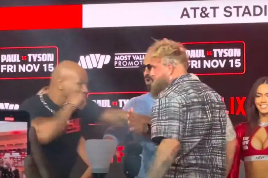 Mike Tyson Swings On Jake Paul