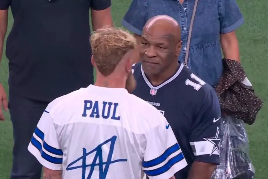 Mike Tyson and Jake Paul On The NFL Football Field Ahead Of Fight