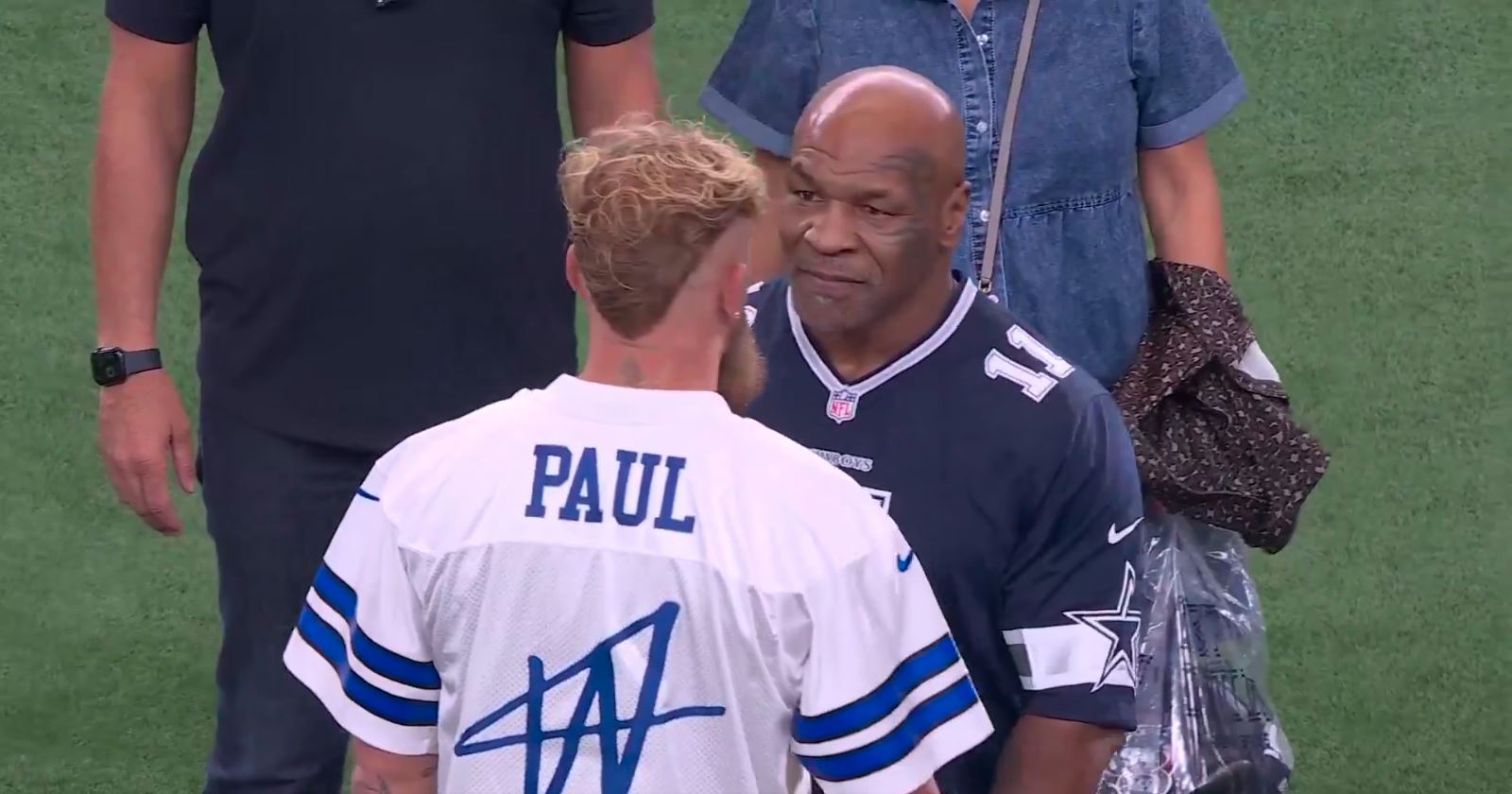 Mike Tyson and Jake Paul On The NFL Football Field Ahead Of Fight